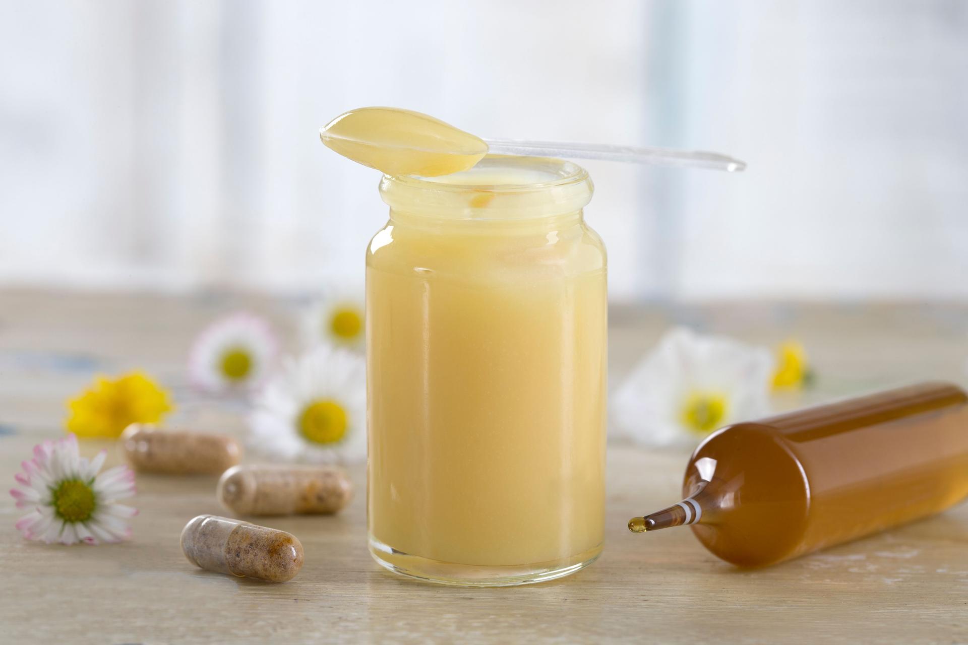 raw organic royal jelly in a small bottle